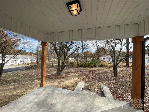 a view of a street with sitting area