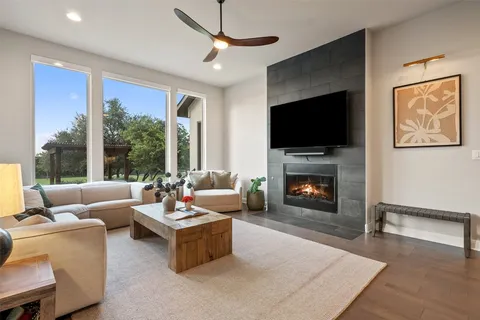 a large kitchen with kitchen island a large island in the center and stainless steel appliances