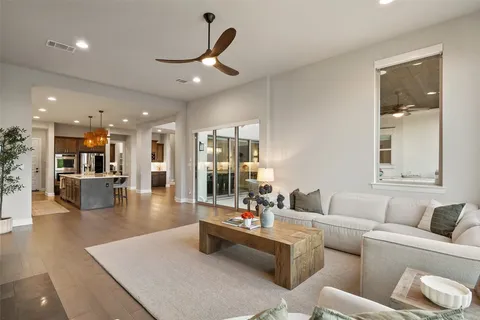 a bedroom with a large bed and a couch