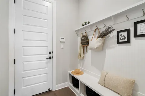 a view of a livingroom with furniture and a workspace
