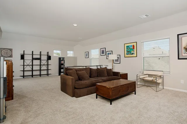 a living room with furniture and a couch
