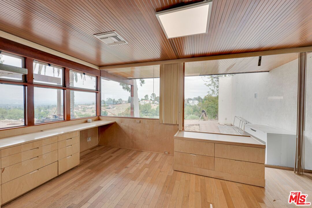 17728 Ridgeway Road Granada Hills, CA 91344 - Photo 23 of 54 a view of a large kitchen with a large window