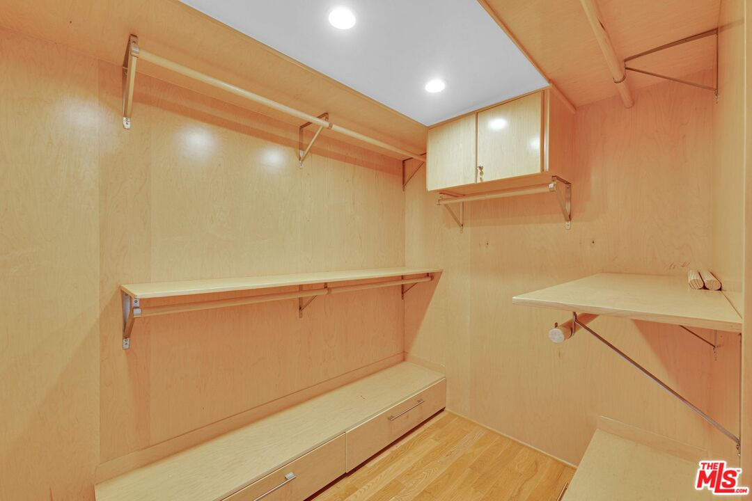 17728 Ridgeway Road Granada Hills, CA 91344 - Photo 25 of 54 a bathroom with a shower and a sink