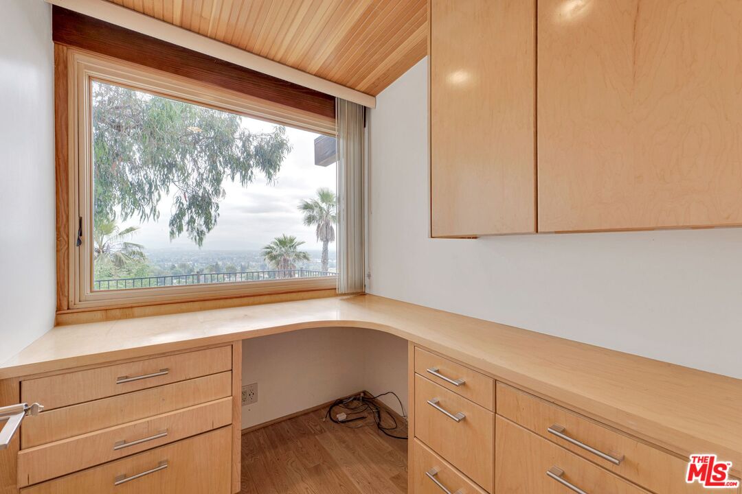17728 Ridgeway Road Granada Hills, CA 91344 - Photo 29 of 54 a view of a window with cabinet
