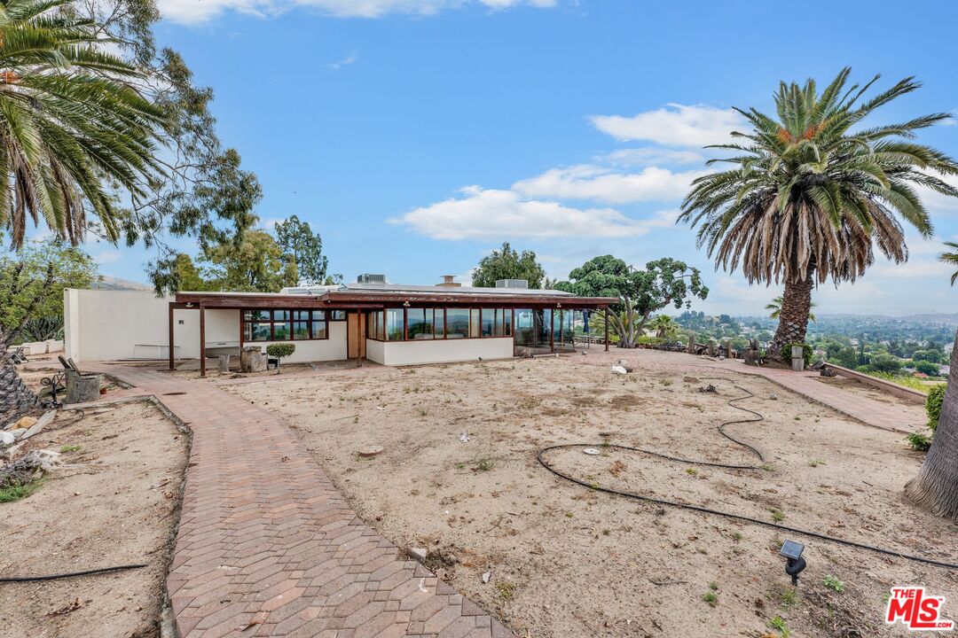 17728 Ridgeway Road Granada Hills, CA 91344 - Photo 42 of 54 a view of a terrace with a garden