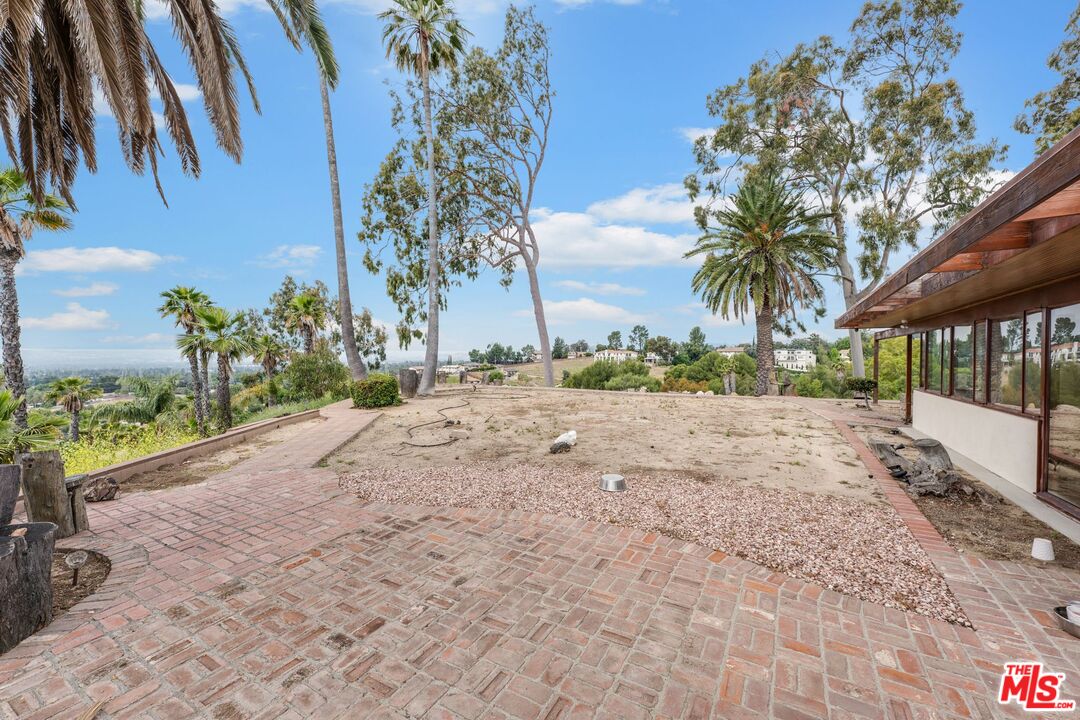 17728 Ridgeway Road Granada Hills, CA 91344 - Photo 48 of 54 a view of backyard with outdoor seating