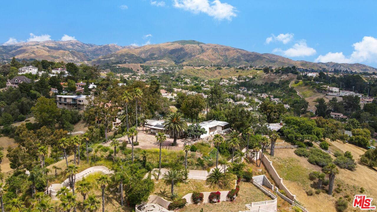 17728 Ridgeway Road Granada Hills, CA 91344 - Photo 51 of 54 a view of a city with mountains in the background