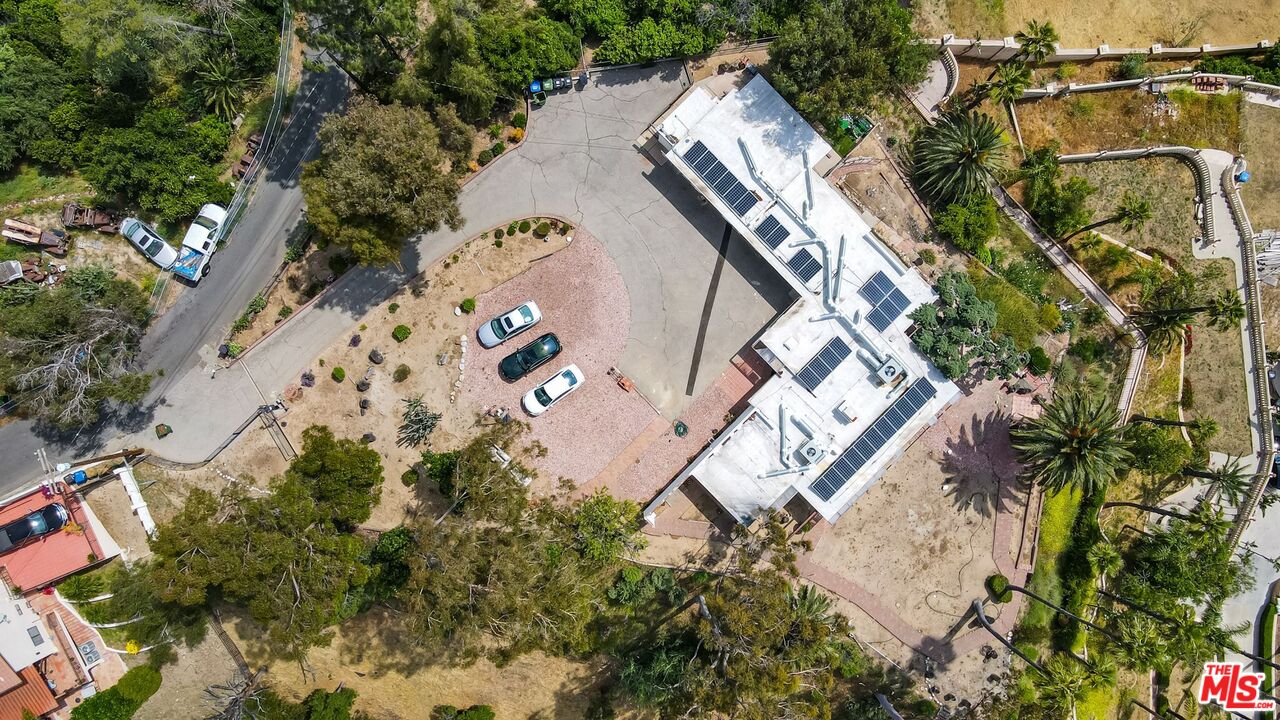 17728 Ridgeway Road Granada Hills, CA 91344 - Photo 54 of 54 an aerial view of a house with a yard