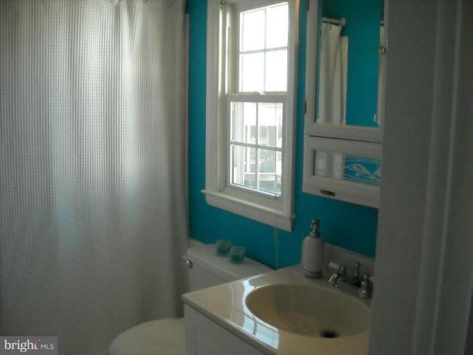4430 Kendi Road Nottingham, MD 21236 - Photo 13 of 13 a bathroom with a sink and toilet