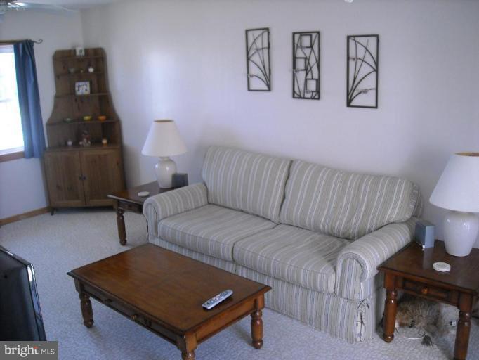 4430 Kendi Road Nottingham, MD 21236 - Photo 4 of 13 a living room with furniture and rug