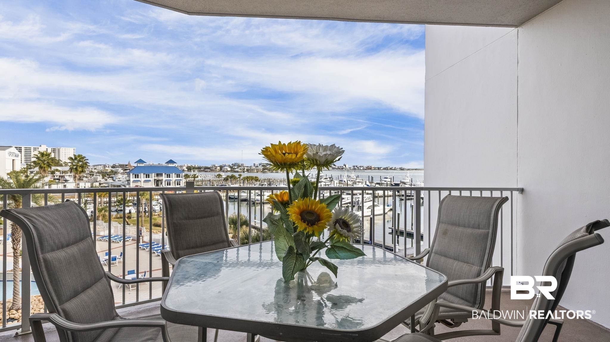 27800 Canal Road, Unit 313 Orange Beach, AL 36561 - Photo 11 of 23 Balcony with outdoor dining area