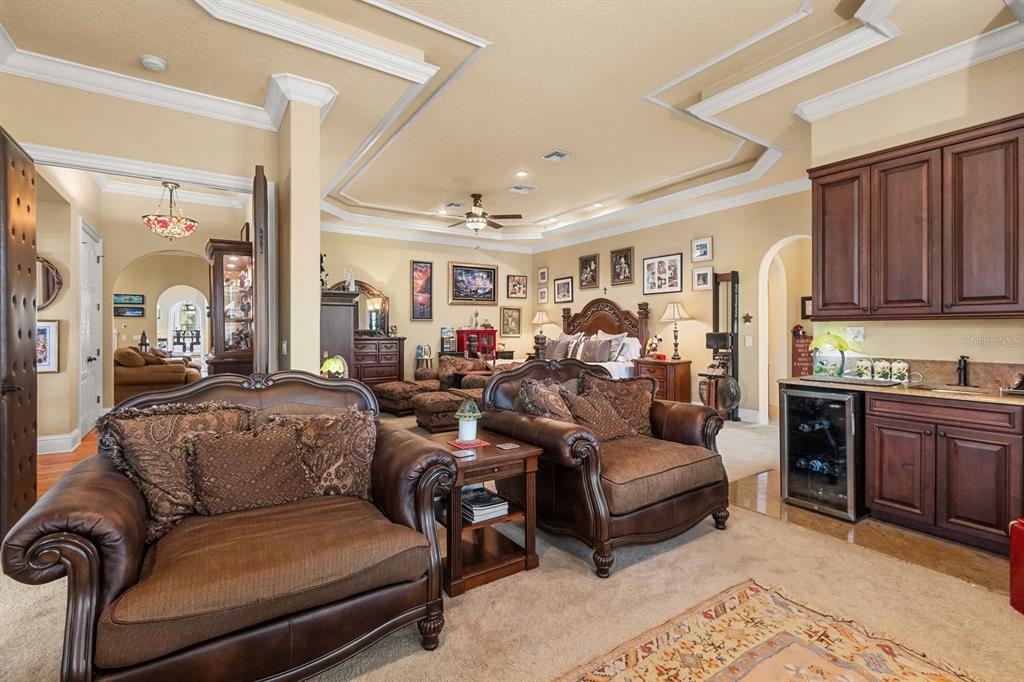 9400 Laws Road Clermont, FL 34714 - Photo 22 of 58 a living room with furniture and a wooden floor