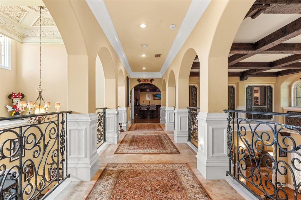 9400 Laws Road Clermont, FL 34714 - Photo 47 of 58 a view of a hallway with wooden floor and windows