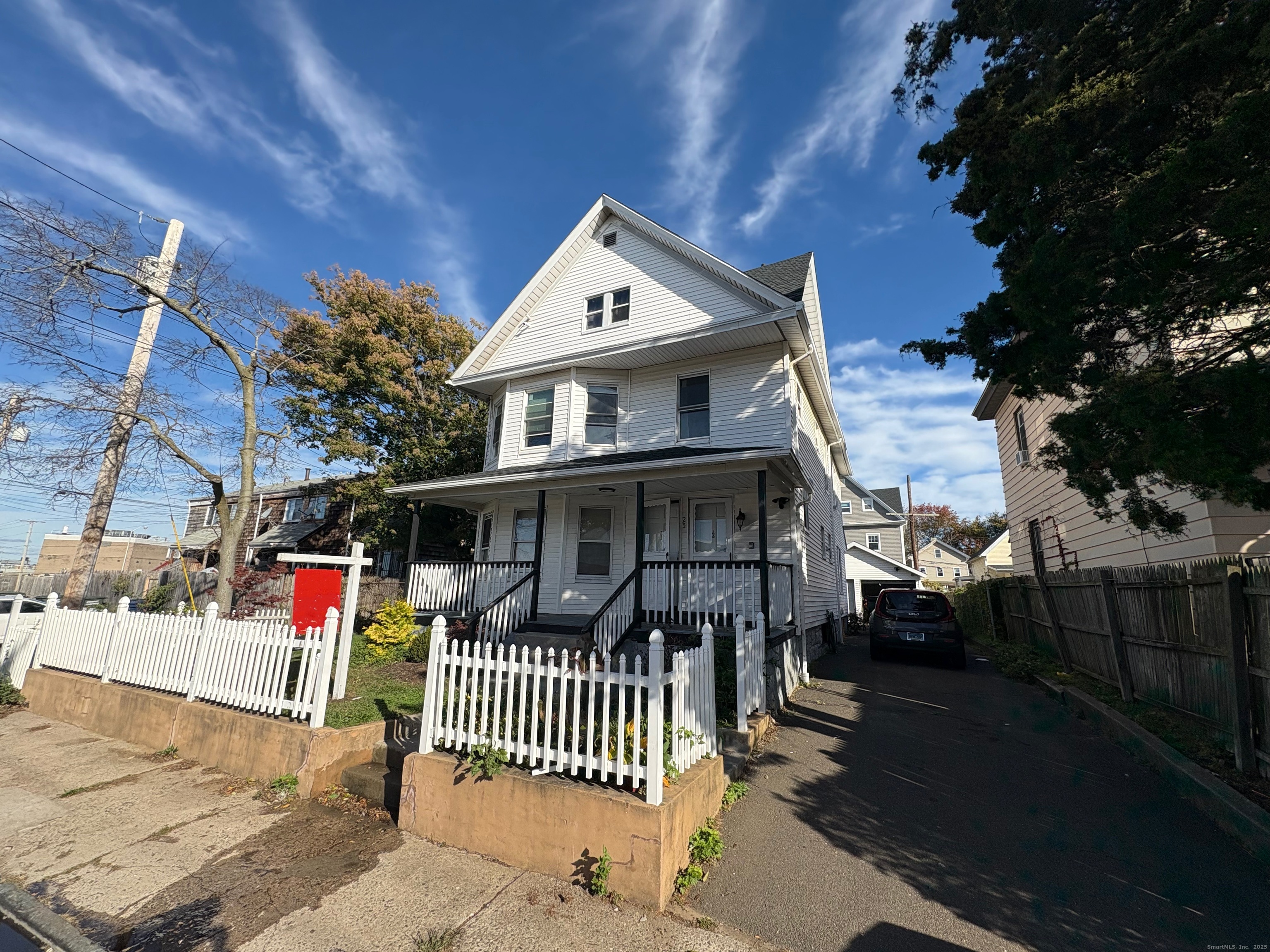 a front view of a house with a porch