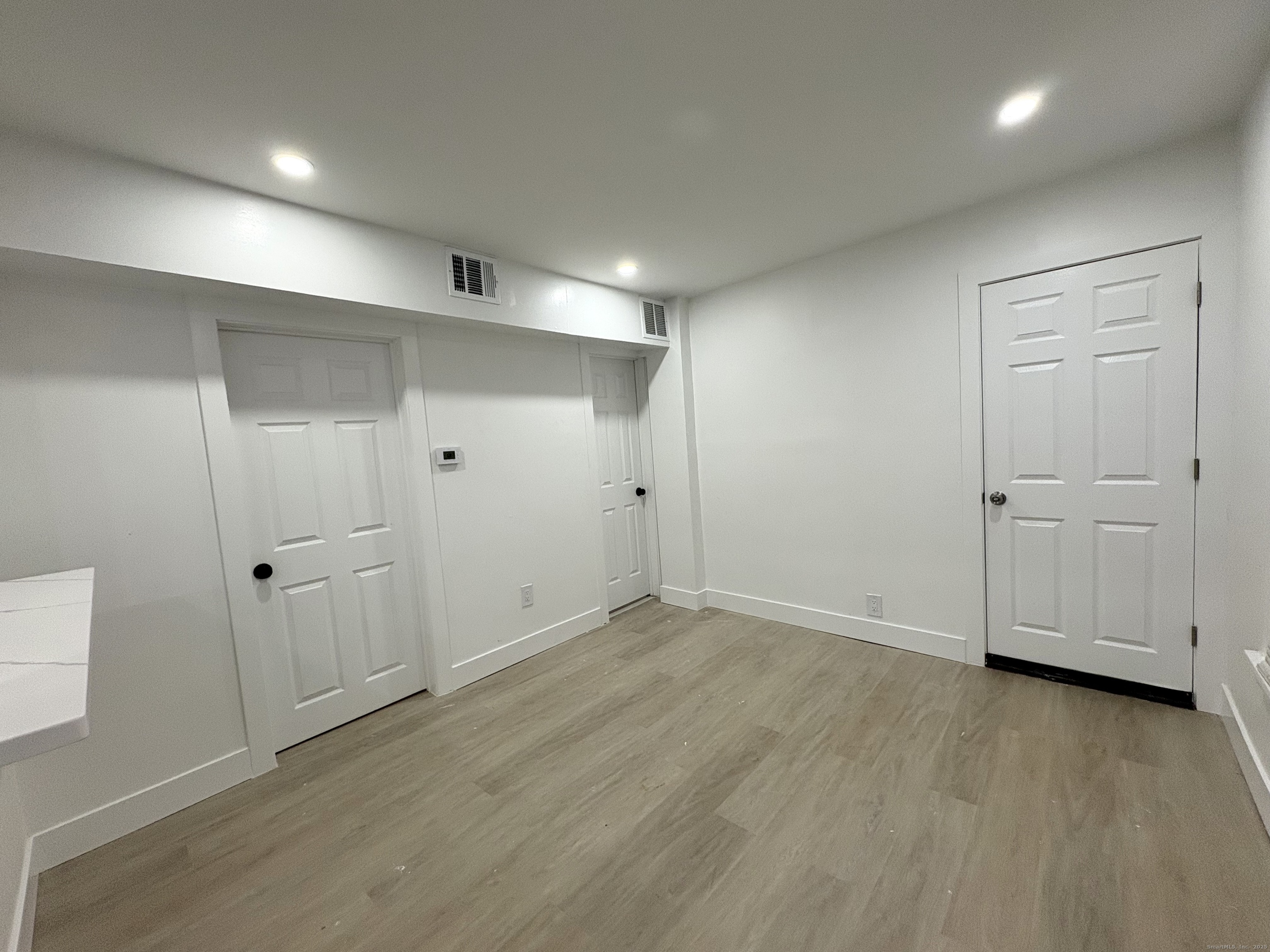 25 Deforest Avenue Bridgeport, CT 06607 - Photo 8 of 11 a view of an empty room