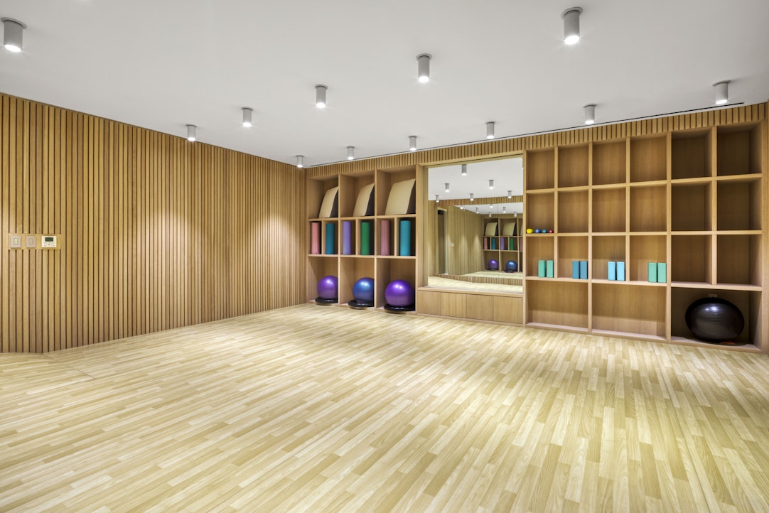 368 3rd Avenue, Unit 32A Manhattan, NY 10016 - Photo 17 of 20 a view of an empty room with wooden floor and windows
