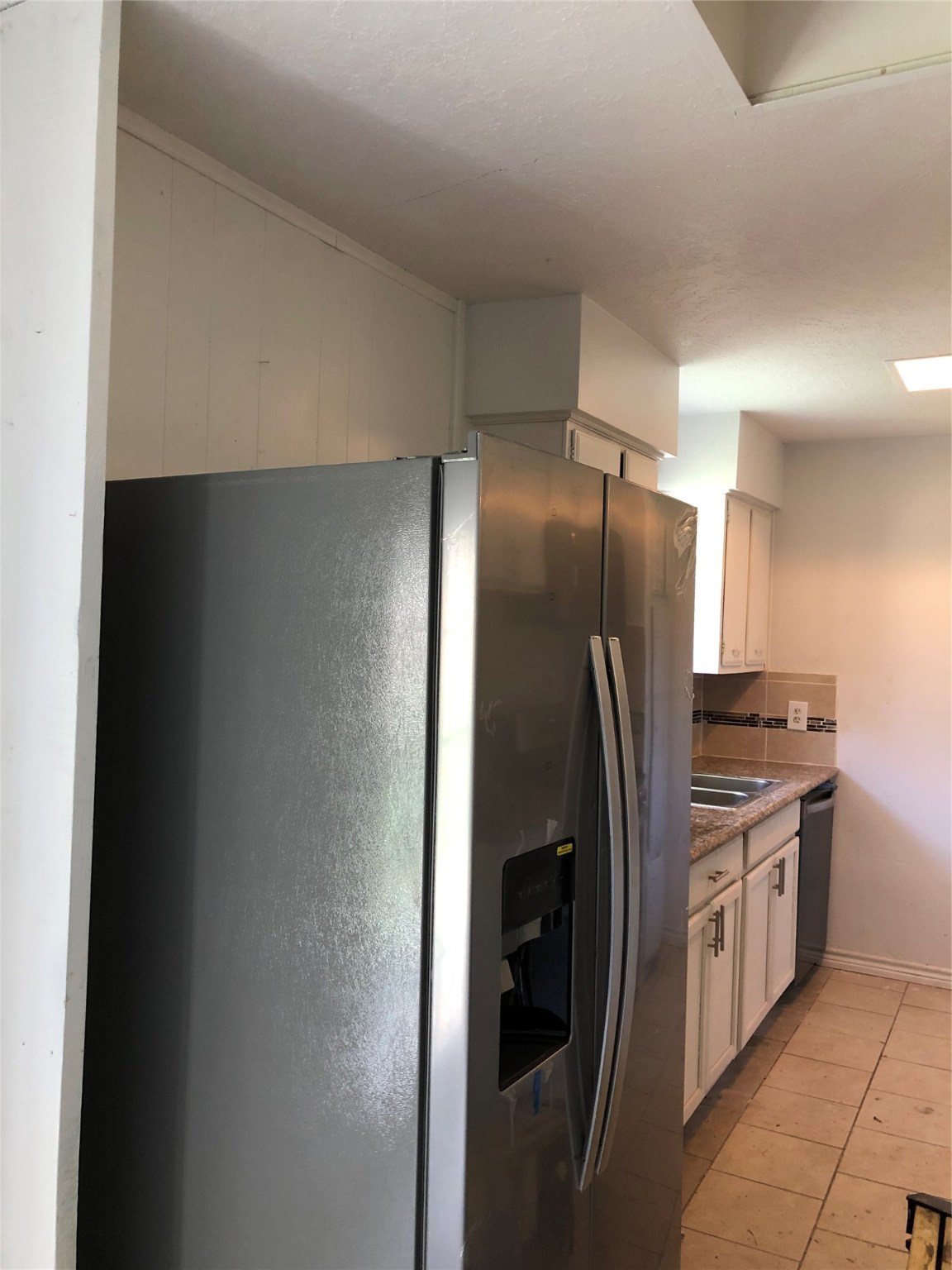 11103 Sharpview Drive Houston, TX 77072 - Photo 3 of 6 a kitchen with stainless steel appliances granite countertop a refrigerator and a stove