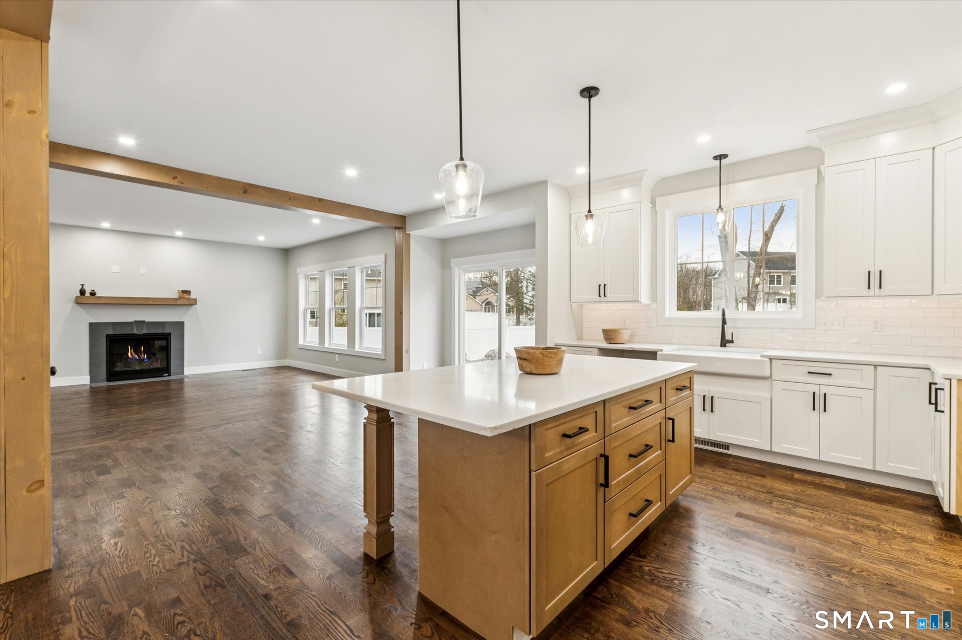 592 Village Street Bristol, CT 06010 - Photo 12 of 38 a kitchen with a sink window and cabinets