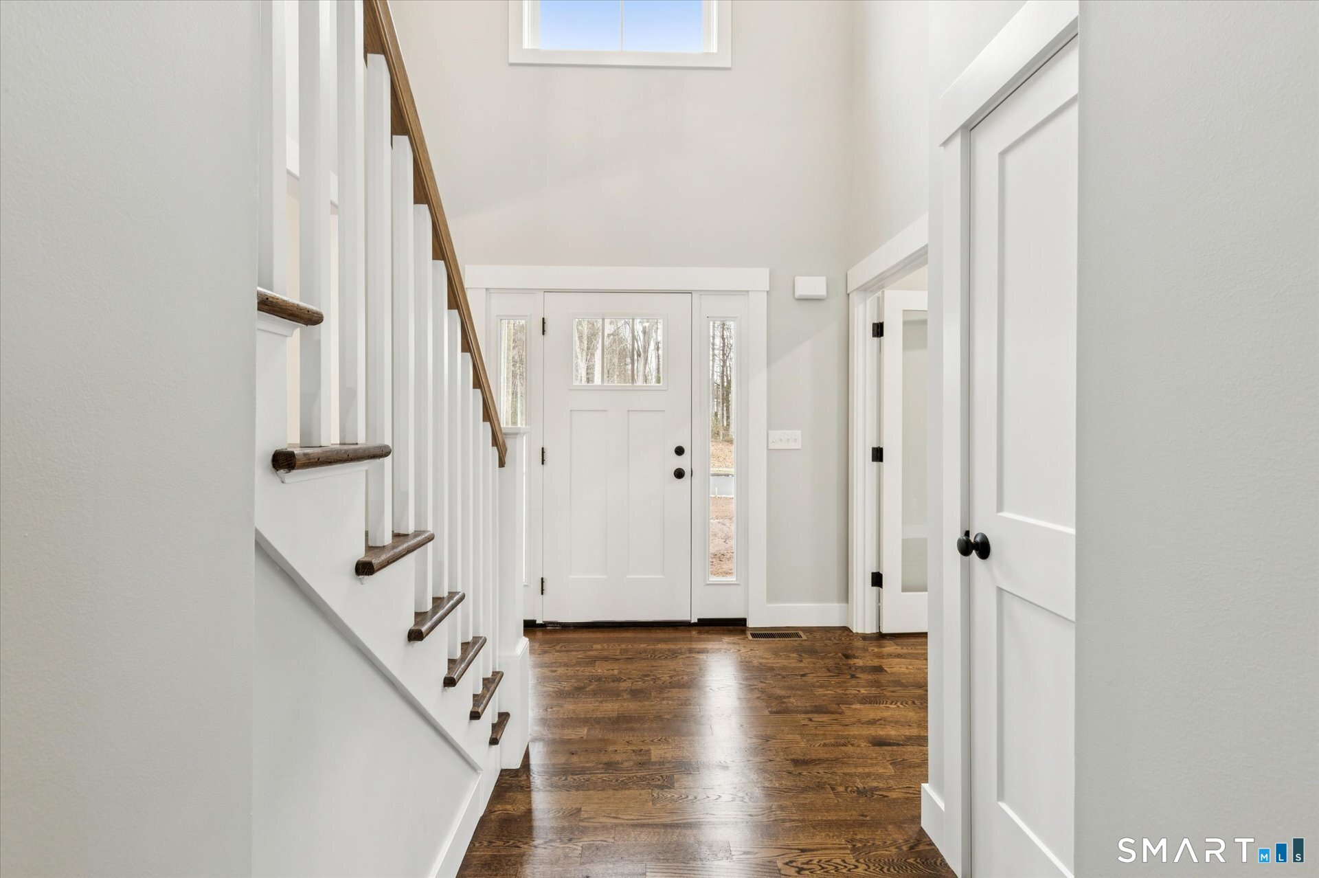 592 Village Street Bristol, CT 06010 - Photo 21 of 38 a view of entryway with wooden floor