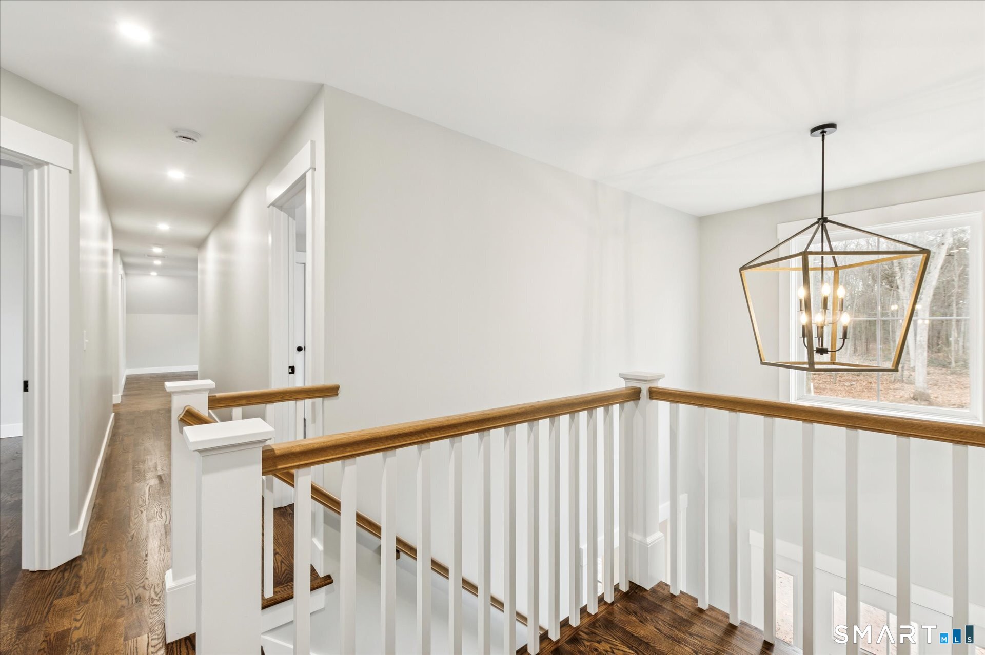 592 Village Street Bristol, CT 06010 - Photo 22 of 38 a view of a hallway with staircase