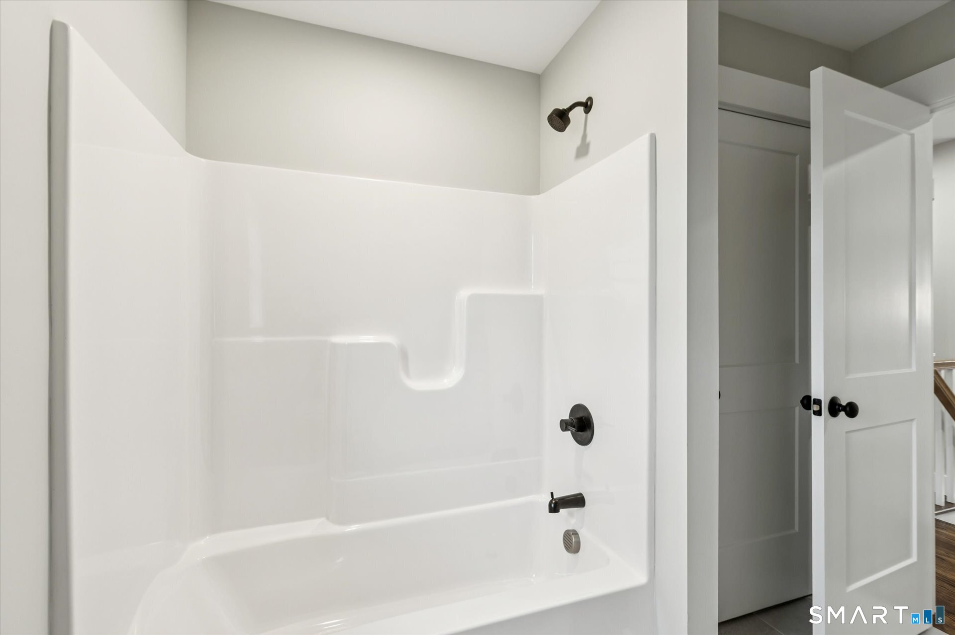 592 Village Street Bristol, CT 06010 - Photo 31 of 38 a bathroom with a bathtub