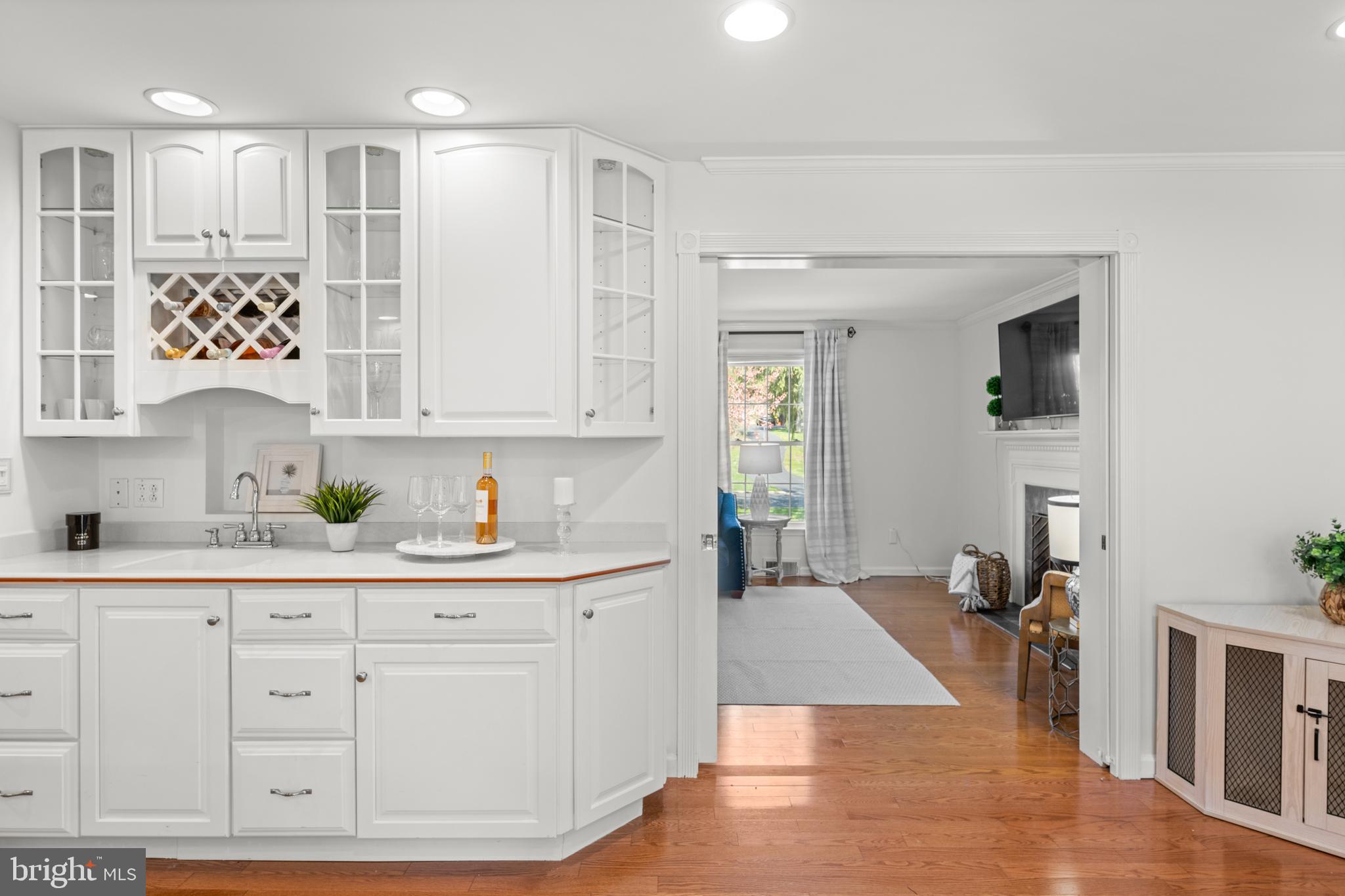 174 Coldstream Drive Berwyn, PA 19312 - Photo 11 of 40 a room with white cabinets and painting on the wall