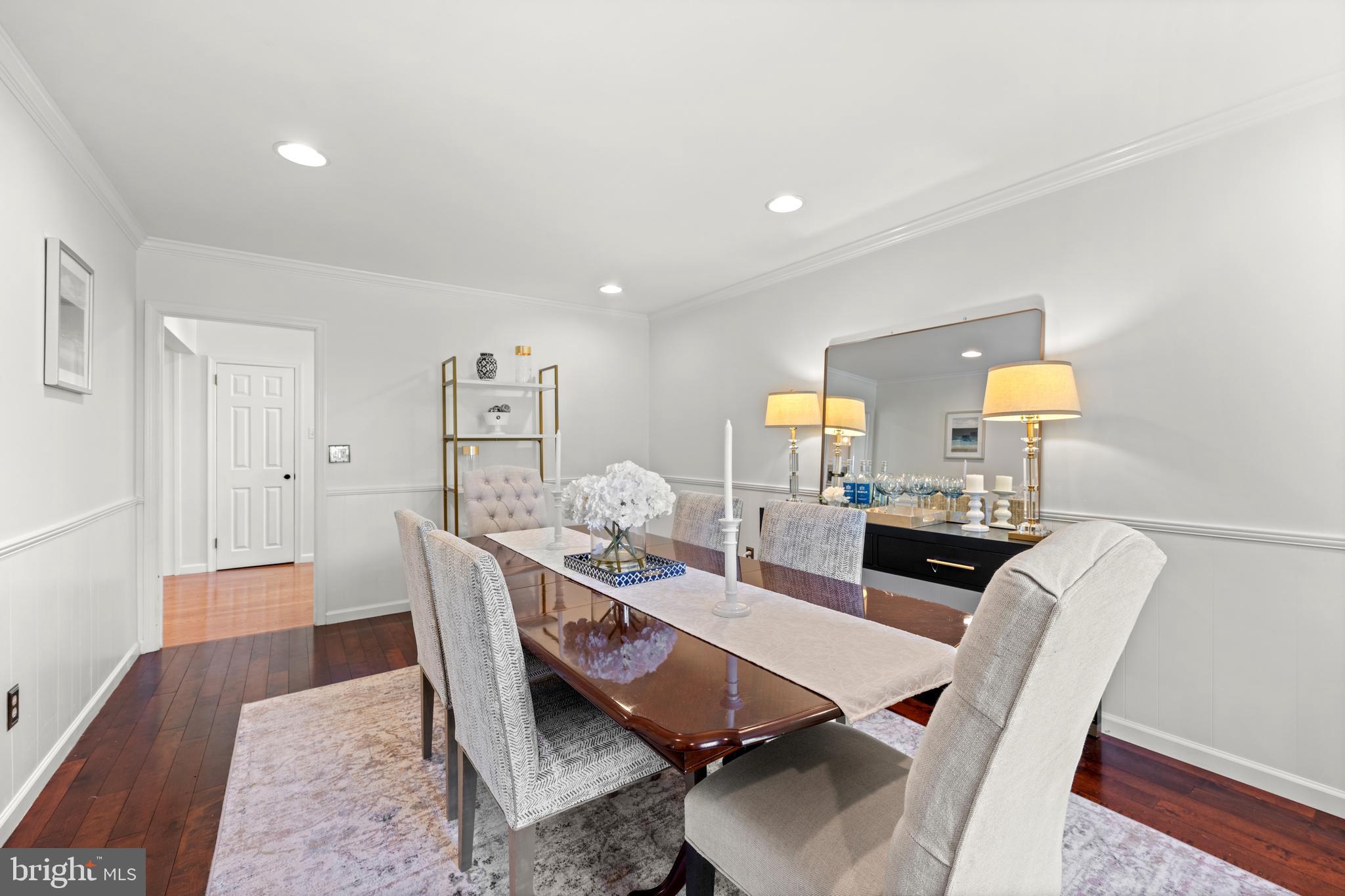174 Coldstream Drive Berwyn, PA 19312 - Photo 15 of 40 a dining room with furniture and wooden floor