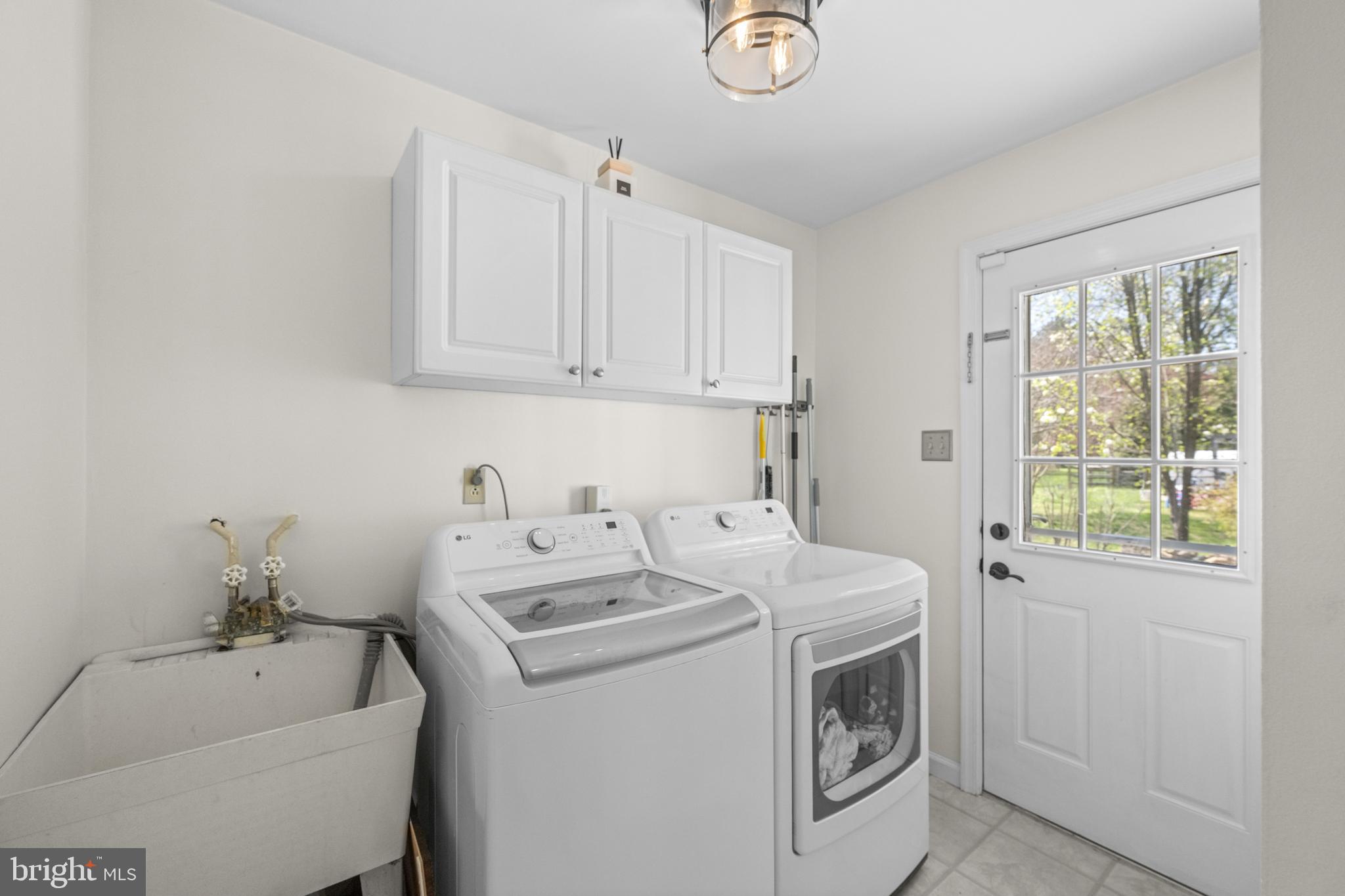 174 Coldstream Drive Berwyn, PA 19312 - Photo 16 of 40 a utility room with dryer and washer
