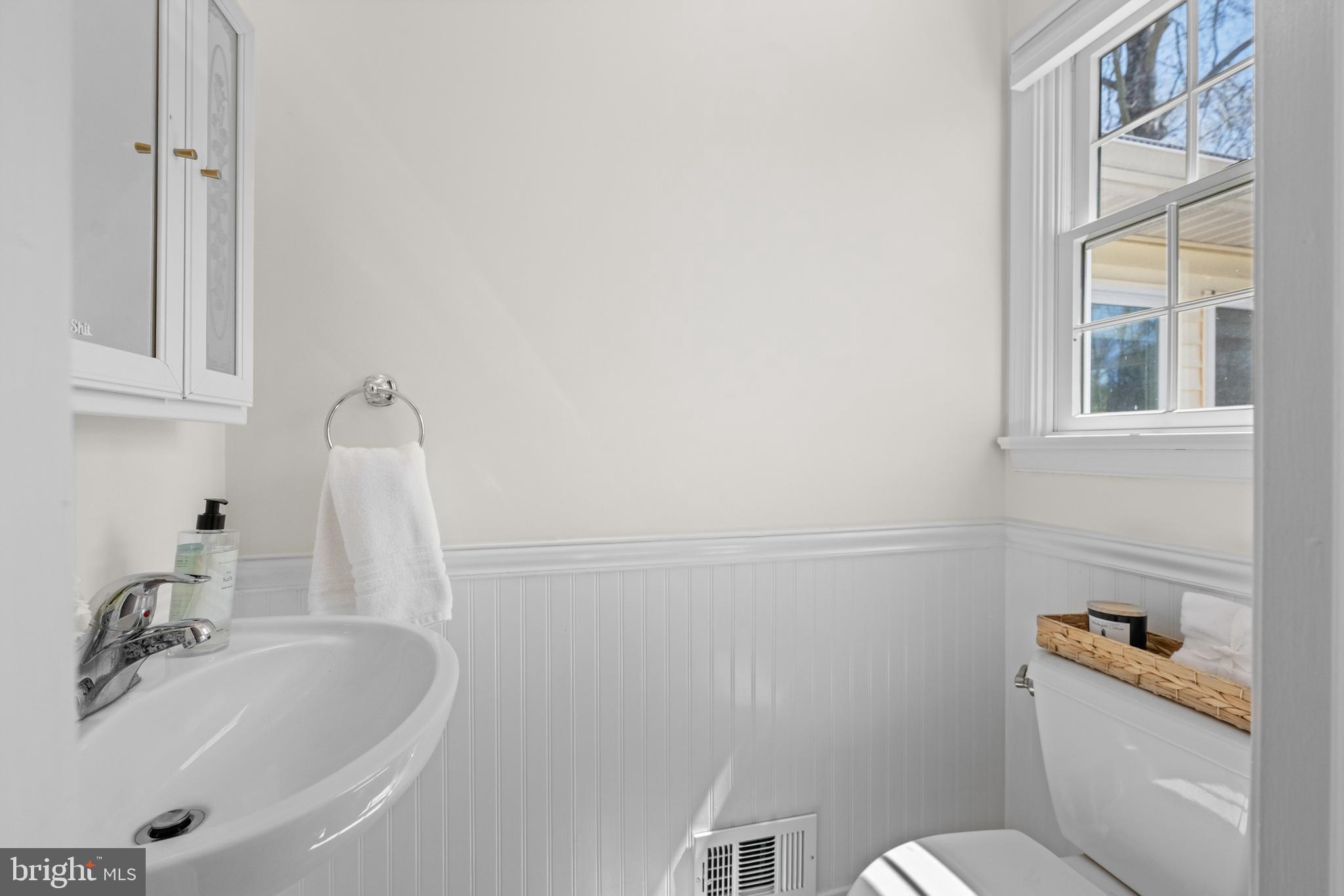 174 Coldstream Drive Berwyn, PA 19312 - Photo 17 of 40 a bathroom with a sink a toilet and a mirror
