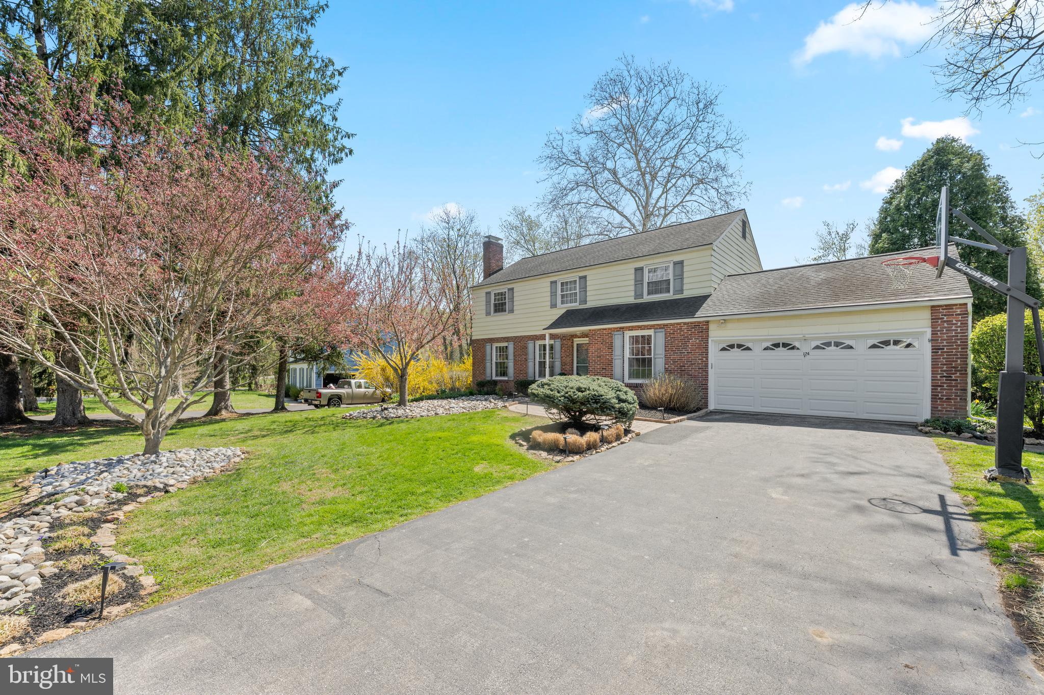 174 Coldstream Drive Berwyn, PA 19312 - Photo 3 of 40 a view of a house with a yard and pathway