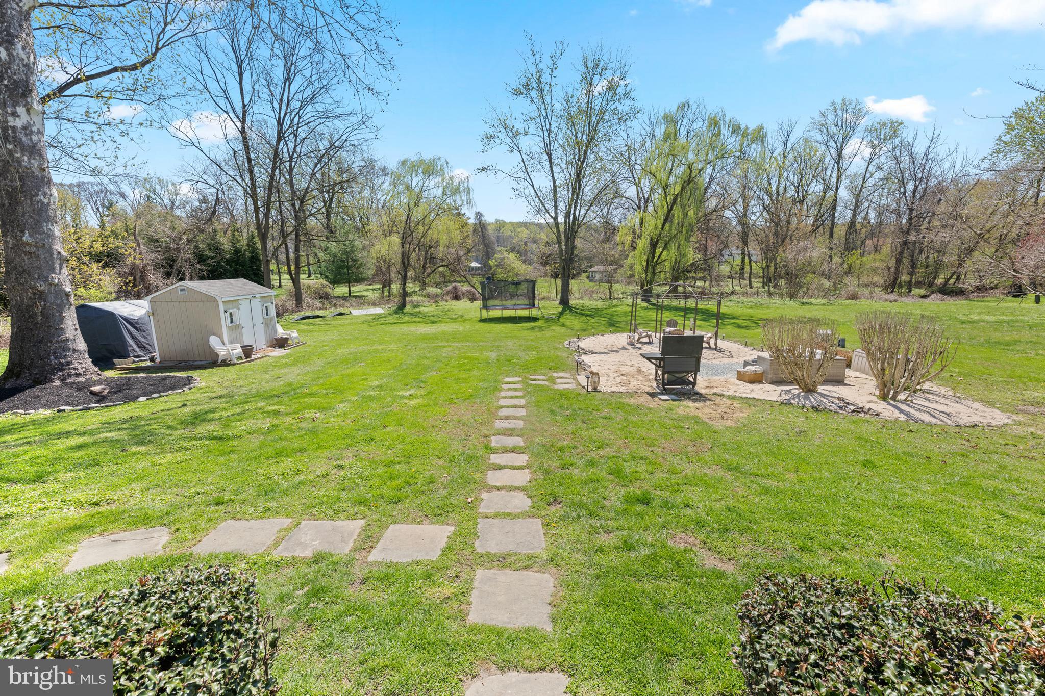 174 Coldstream Drive Berwyn, PA 19312 - Photo 37 of 40 a view of a garden with lawn chairs