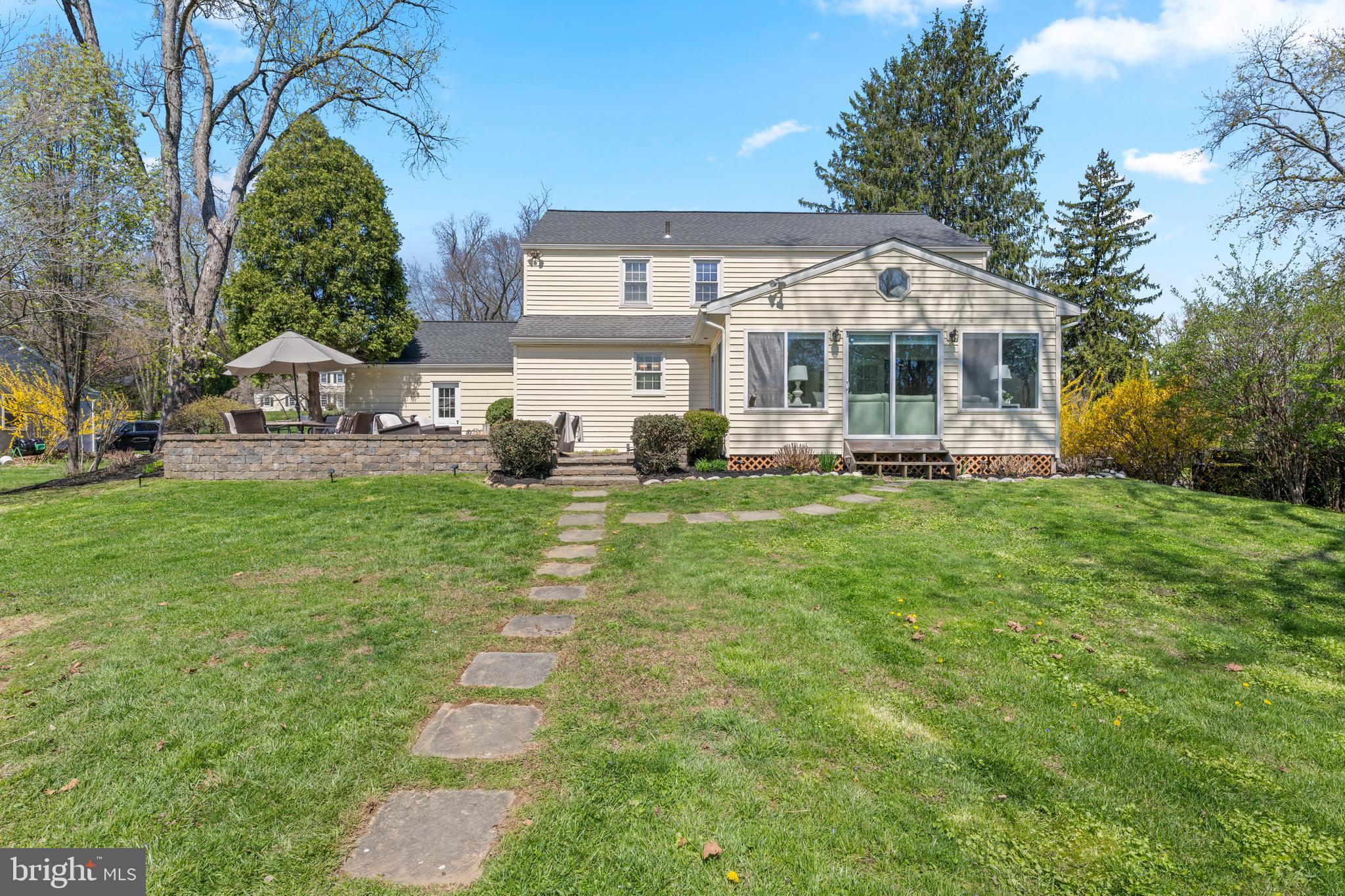 174 Coldstream Drive Berwyn, PA 19312 - Photo 39 of 40 a front view of a house with garden
