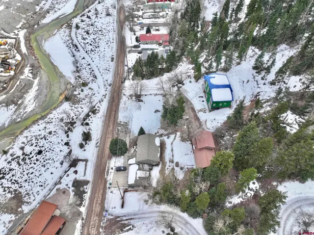 a view of snow on the road