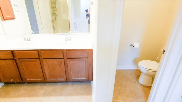 a bathroom with a sink and a vanity