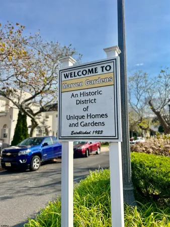 a sign on the side of a street