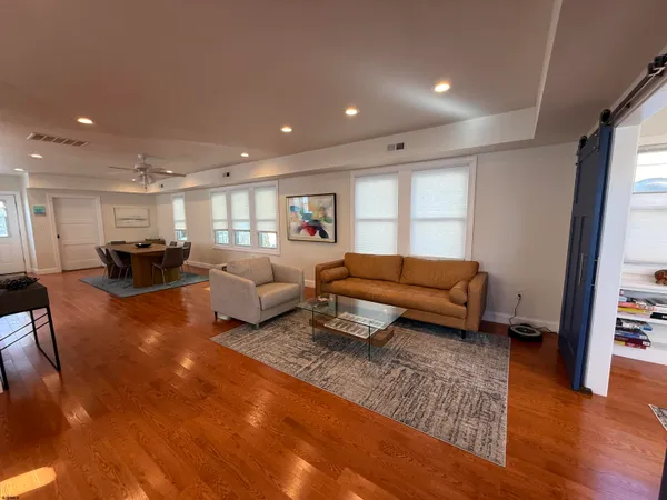 a living room with furniture and a couch