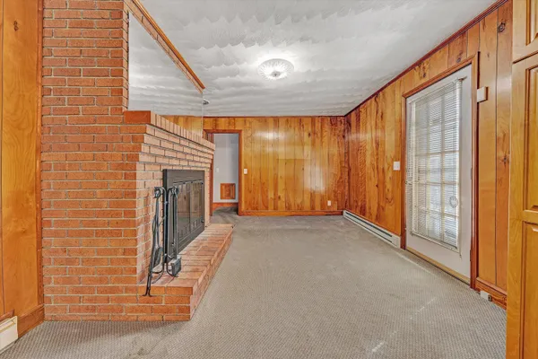 a view of a livingroom with a fireplace