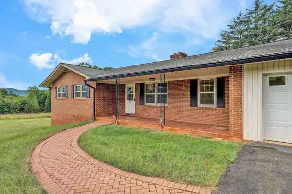 front view of house with a yard