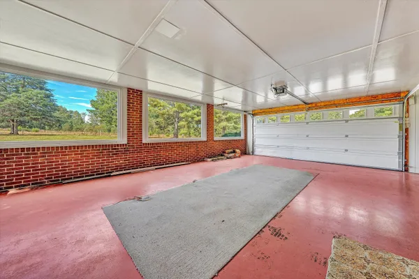 a view of balcony with furniture