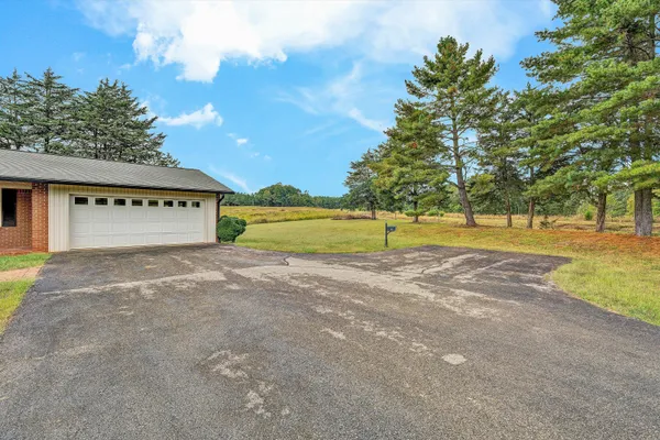 a view of an empty room with a house