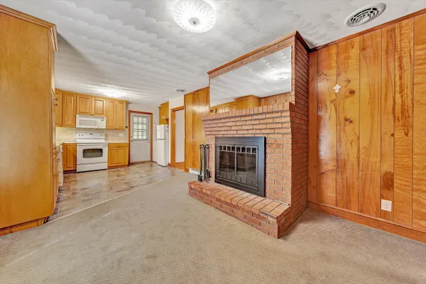 a view of a livingroom with a fireplace