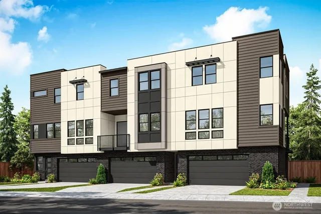 a front view of a building with a garden