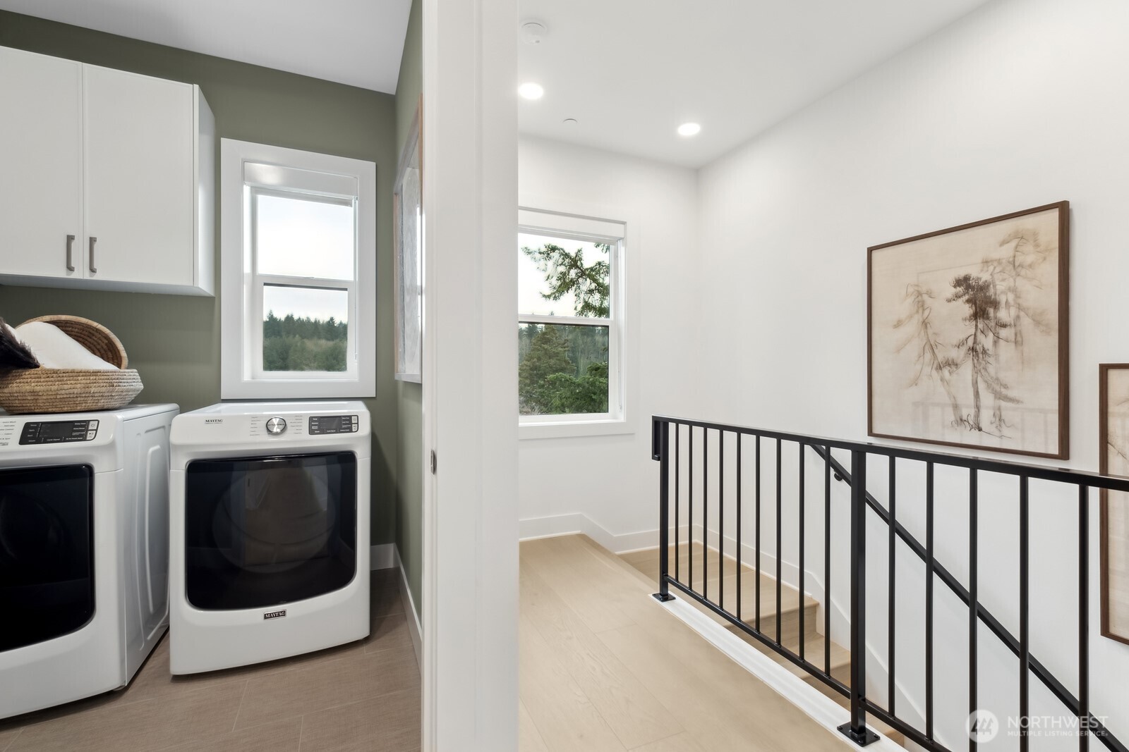 18913 99th Place Northeast, Unit A Bothell, WA 98011 - Photo 24 of 28 a view of a hallway with washer and dryer