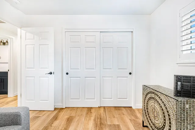 a view of a patio with couches and potted plants