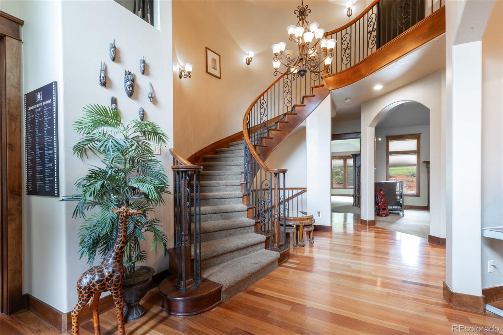 13680 Wide Acres Road Golden, CO 80401 - Photo 4 of 26 a view of a livingroom with stairs and wooden floor