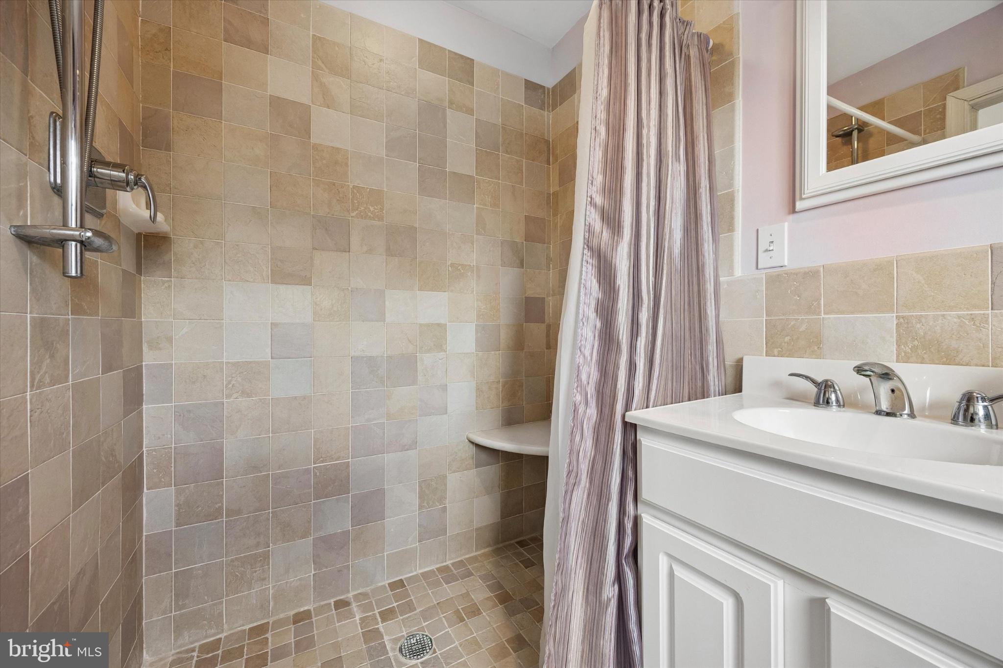 239 Brydon Road Wynnewood, PA 19096 - Photo 20 of 35 Elegant tiled shower retreat.
