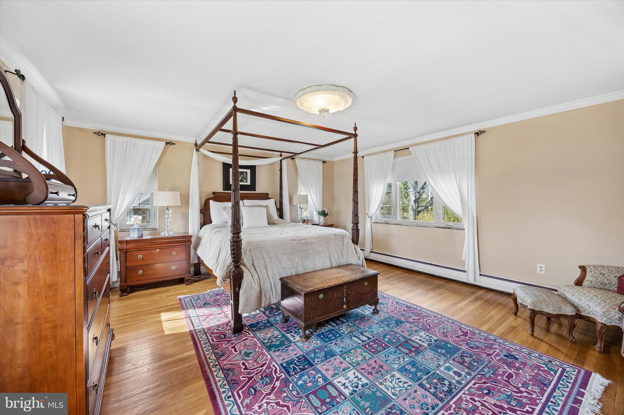 239 Brydon Road Wynnewood, PA 19096 - Photo 27 of 35 Elegant bedroom with natural light.