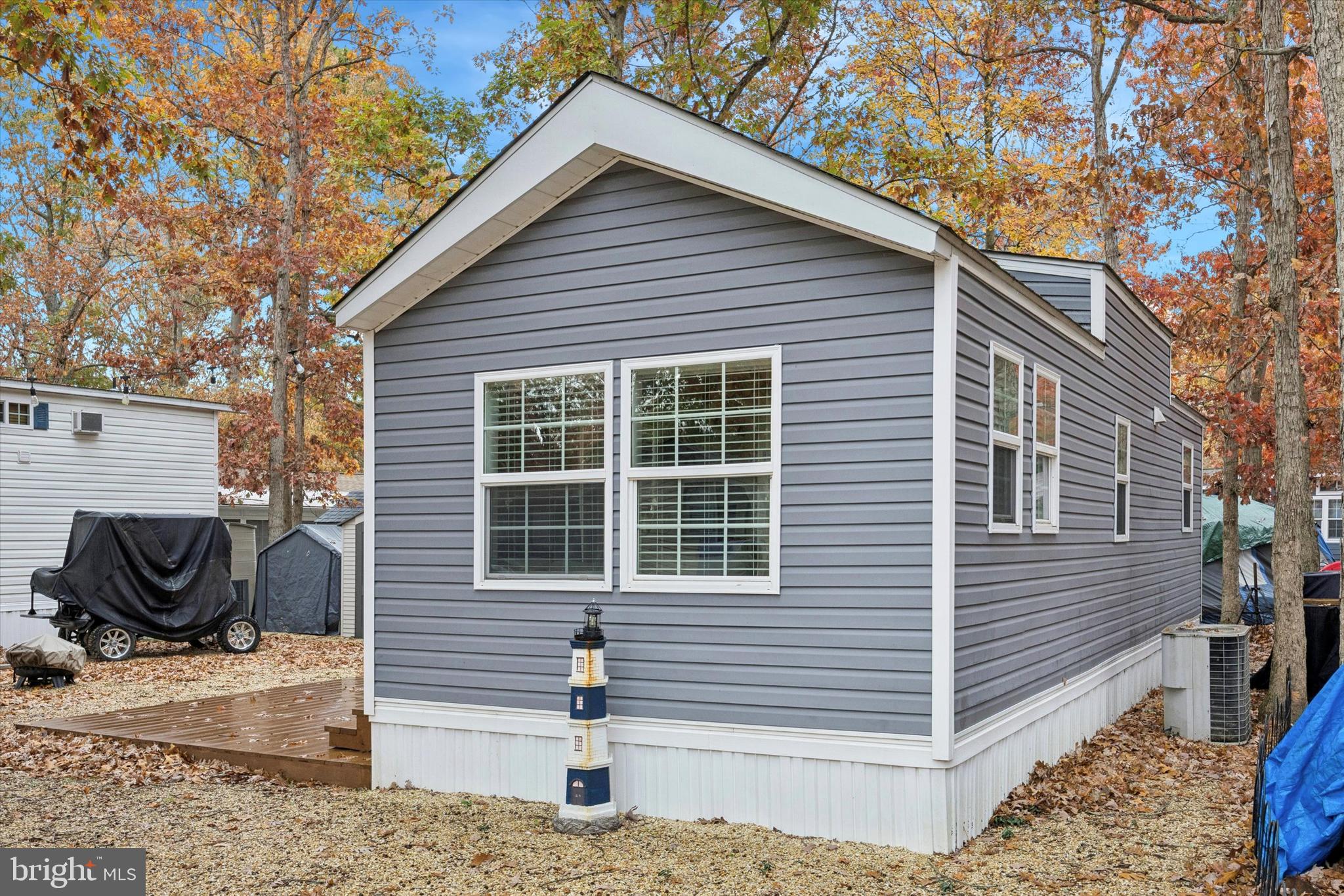 515 Corsons Tavern Road, Unit E 42 Ocean View, NJ 08230 - Photo 16 of 25 a front view of a house with a yard