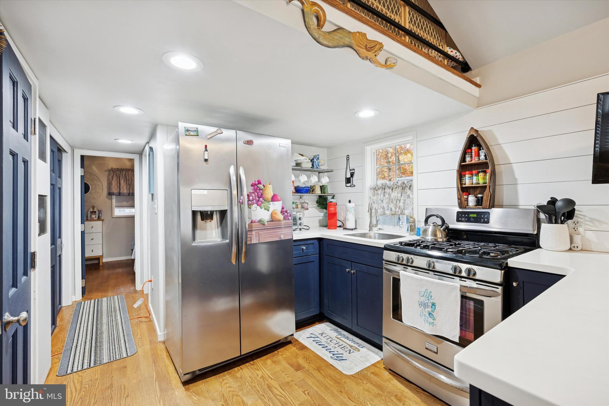 515 Corsons Tavern Road, Unit E 42 Ocean View, NJ 08230 - Photo 7 of 25 a kitchen with stainless steel appliances granite countertop a refrigerator and a stove