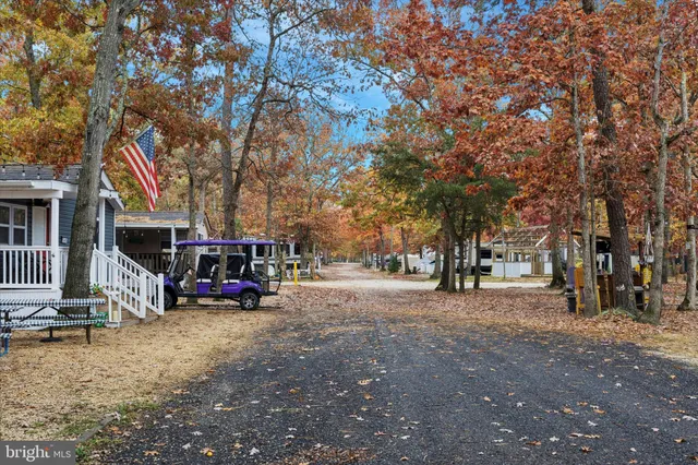 a view of a parked cars in front of a house